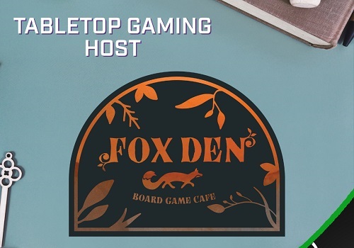 Image of a table with board game paraphernalia as background, with the Fox Den logo in the middle. Text on the photo reads "Tabletop gaming host"